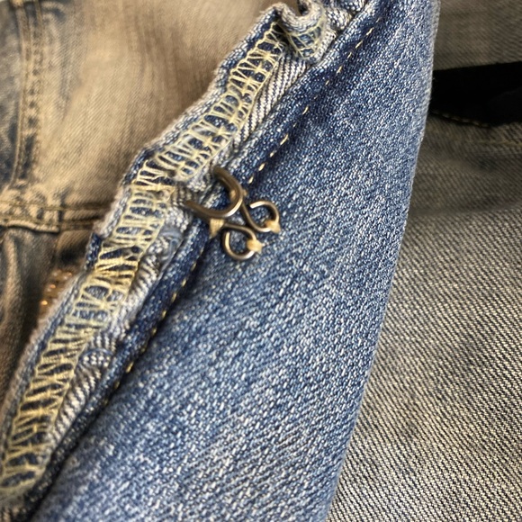 Chico’s Platinum Ruffled Jean jacket with rhinestone pockets and buttons.Size 8 - Picture 10 of 12